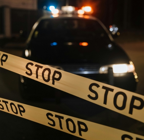 Photo by cottonbro studio: https://www.pexels.com/photo/yellow-crime-tape-against-police-car-10476391/