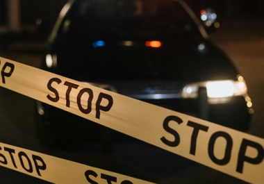 Photo by cottonbro studio: https://www.pexels.com/photo/yellow-crime-tape-against-police-car-10476391/