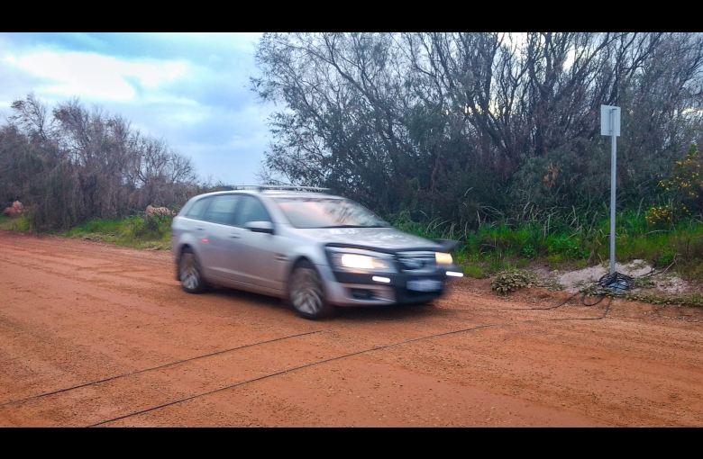 car on dirt road